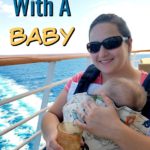 how to cruise with a baby above a mother holding her sleeping child at the back of a cruise ship with wake in the background