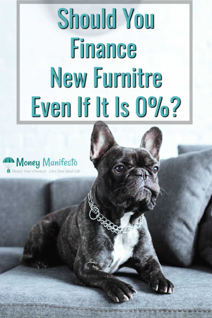 should you finance your new furniture even if it's 0 percent above black dog sitting on gray couch